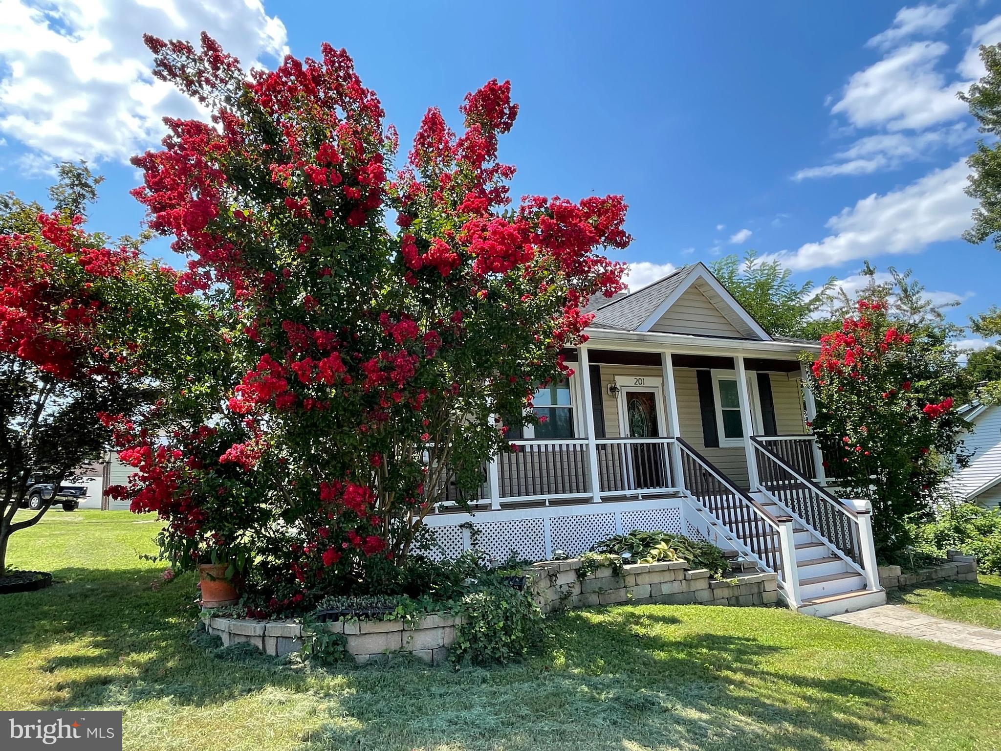 201 Charles Road Linthicum Heights, MD 21090 - Photo 46 of 50 a front view of a house with a yard