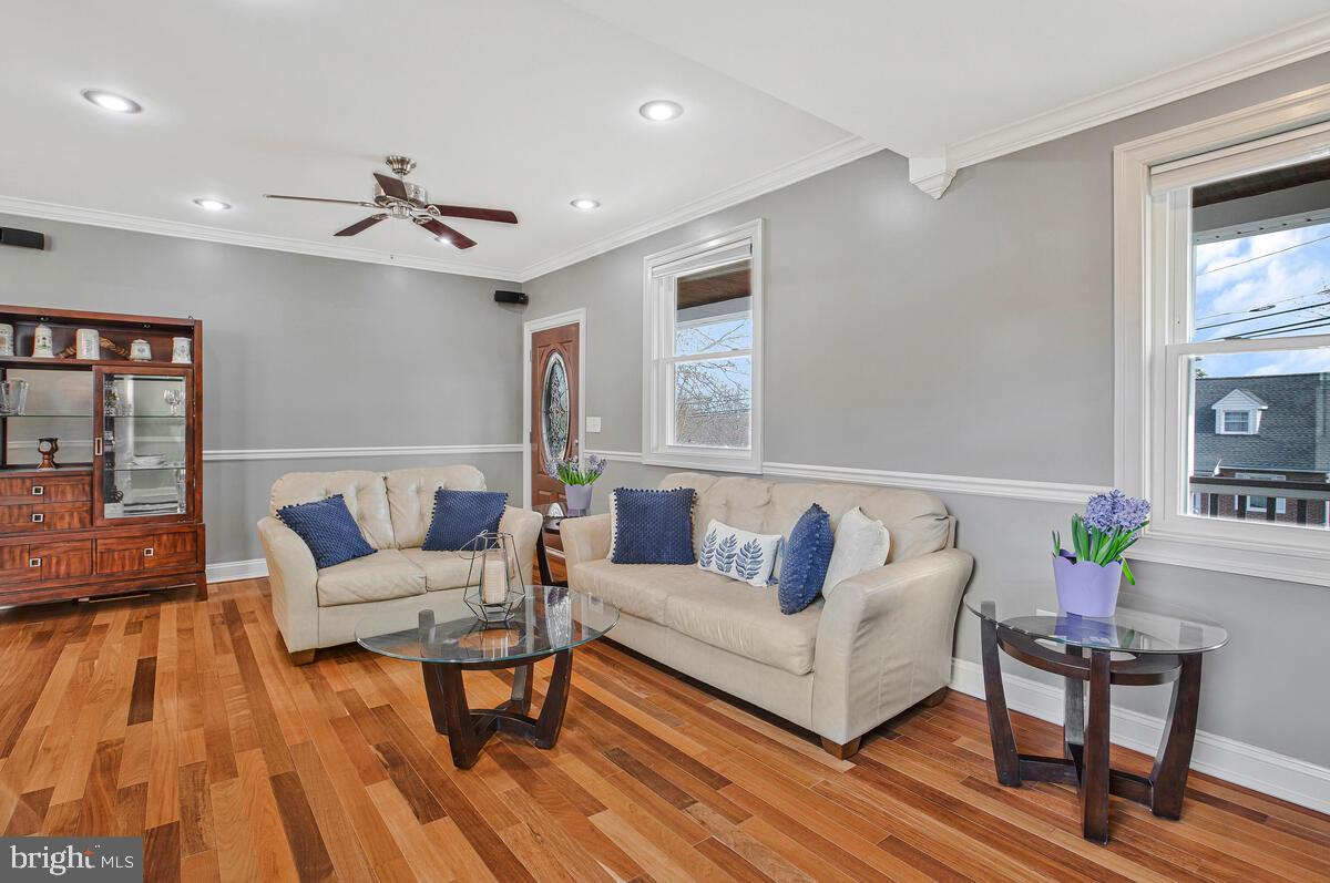 201 Charles Road Linthicum Heights, MD 21090 - Photo 8 of 50 a living room with furniture and wooden floor