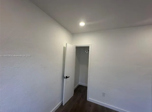 a view of hallway with closet