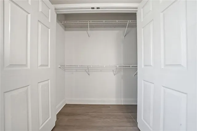 a view of an empty walk in closet