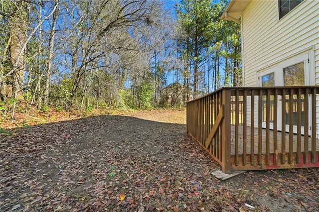 a view of a backyard with a small cabin