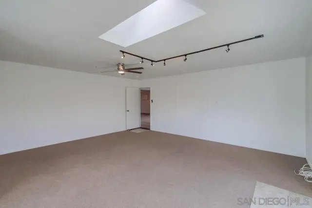 a view of a room with rack and air conditioner
