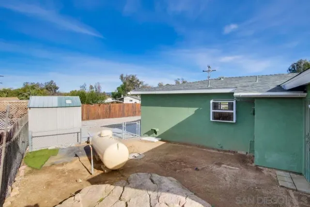 a view of a hallway with seating area