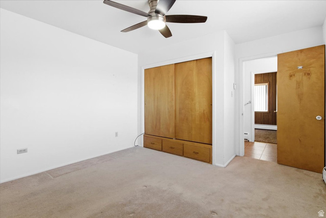 217 East 400 South Spring City, UT 84662 - Photo 23 of 71 Unfurnished bedroom featuring carpet floors, ceiling fan, and a closet