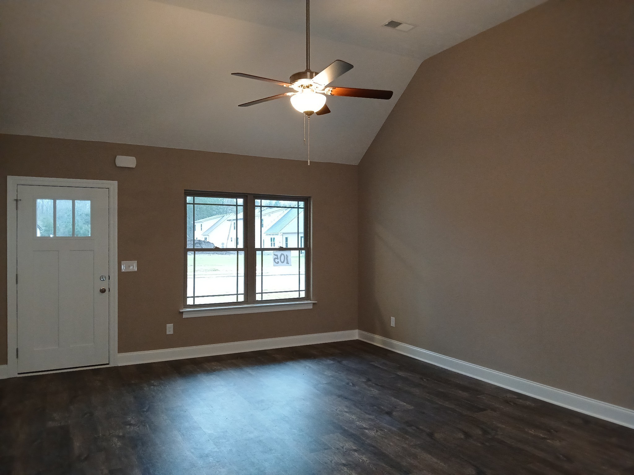 2101 Red Barn Road Christiana, TN 37037 - Photo 61 of 76 a view of a livingroom with a ceiling fan window and wooden floor