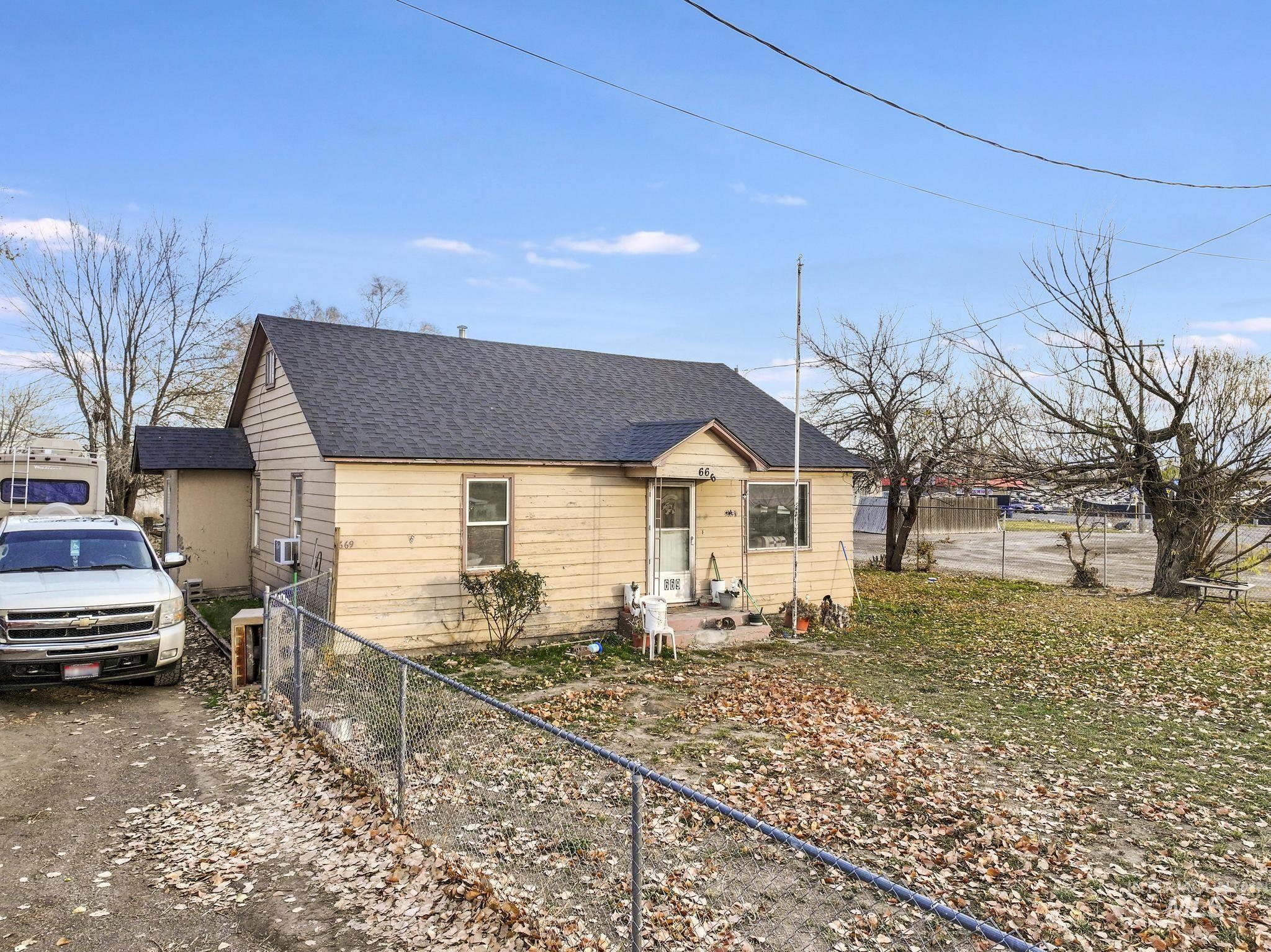 669 Locust Street South Twin Falls, ID 83301 - Photo 24 of 37 Bungalow-style home featuring a fenced front yard and a shingled roof