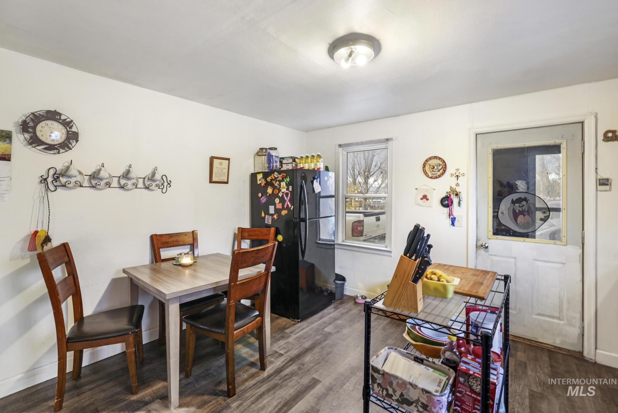 669 Locust Street South Twin Falls, ID 83301 - Photo 6 of 37 Dining space featuring wood finished floors