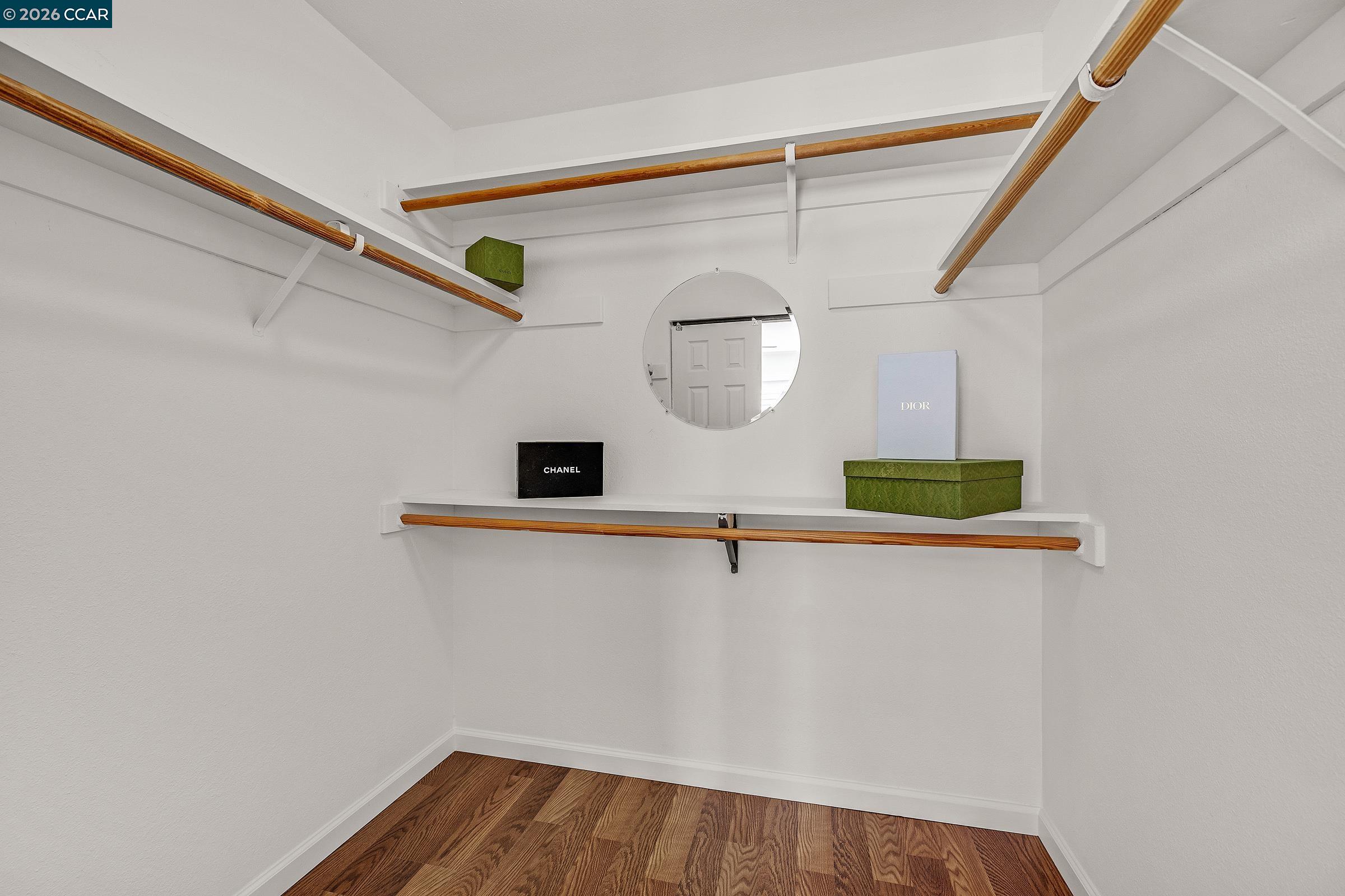 9597 Davona Drive San Ramon, CA 94583 - Photo 12 of 38 a view of a hallway with wooden floor