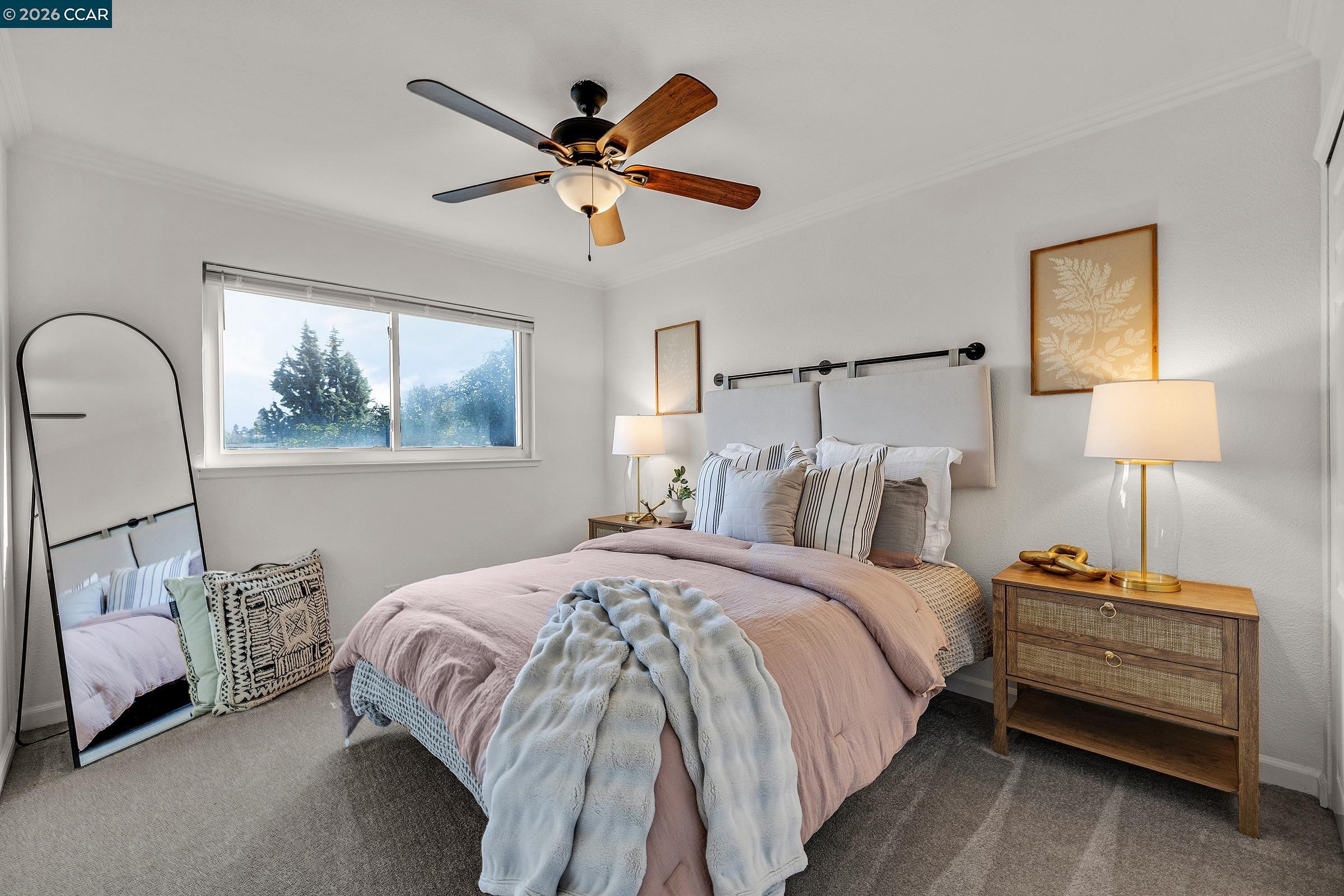 9597 Davona Drive San Ramon, CA 94583 - Photo 21 of 38 a bedroom with bed and a window