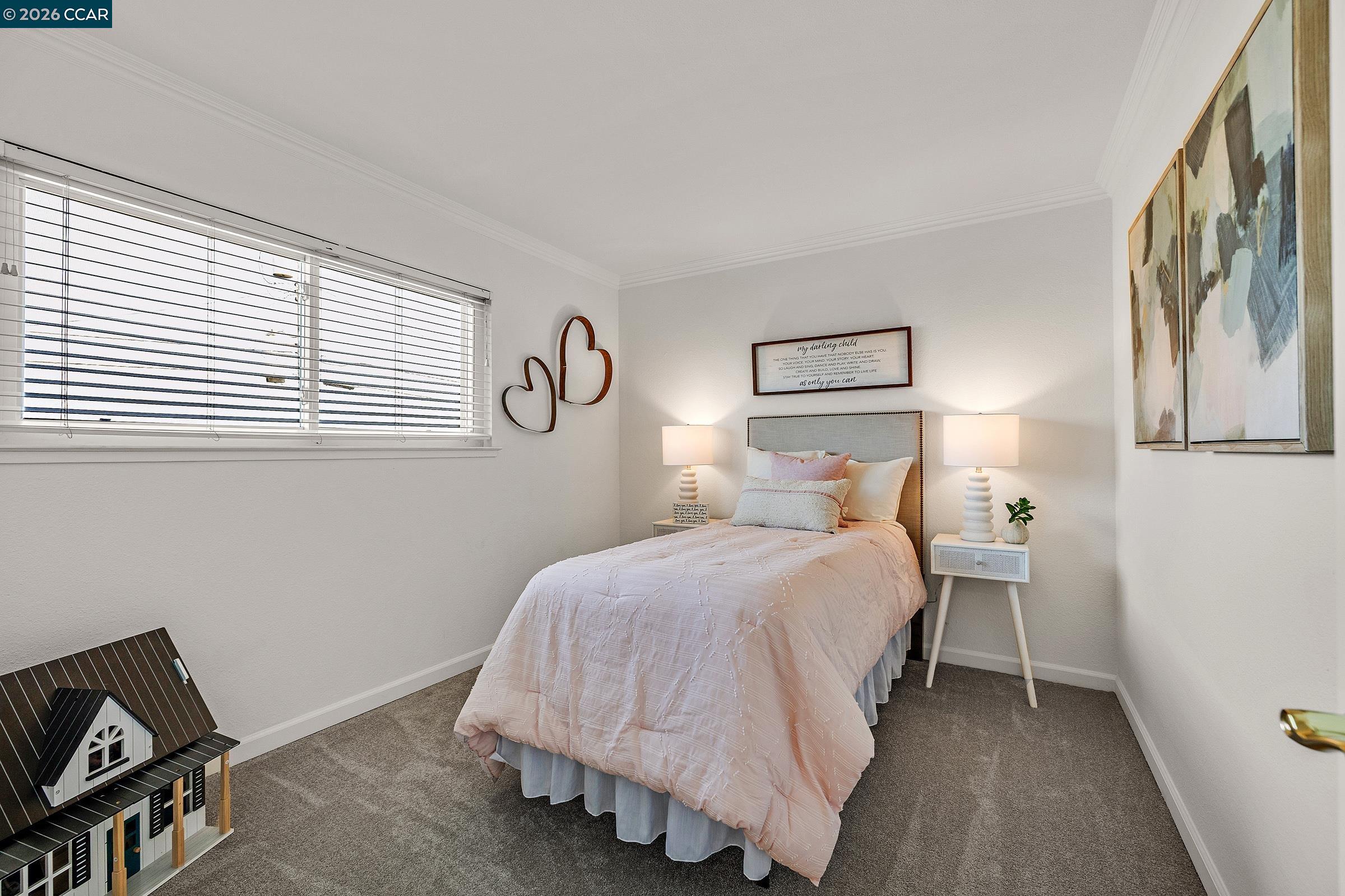 9597 Davona Drive San Ramon, CA 94583 - Photo 23 of 38 a bedroom with a bed and window