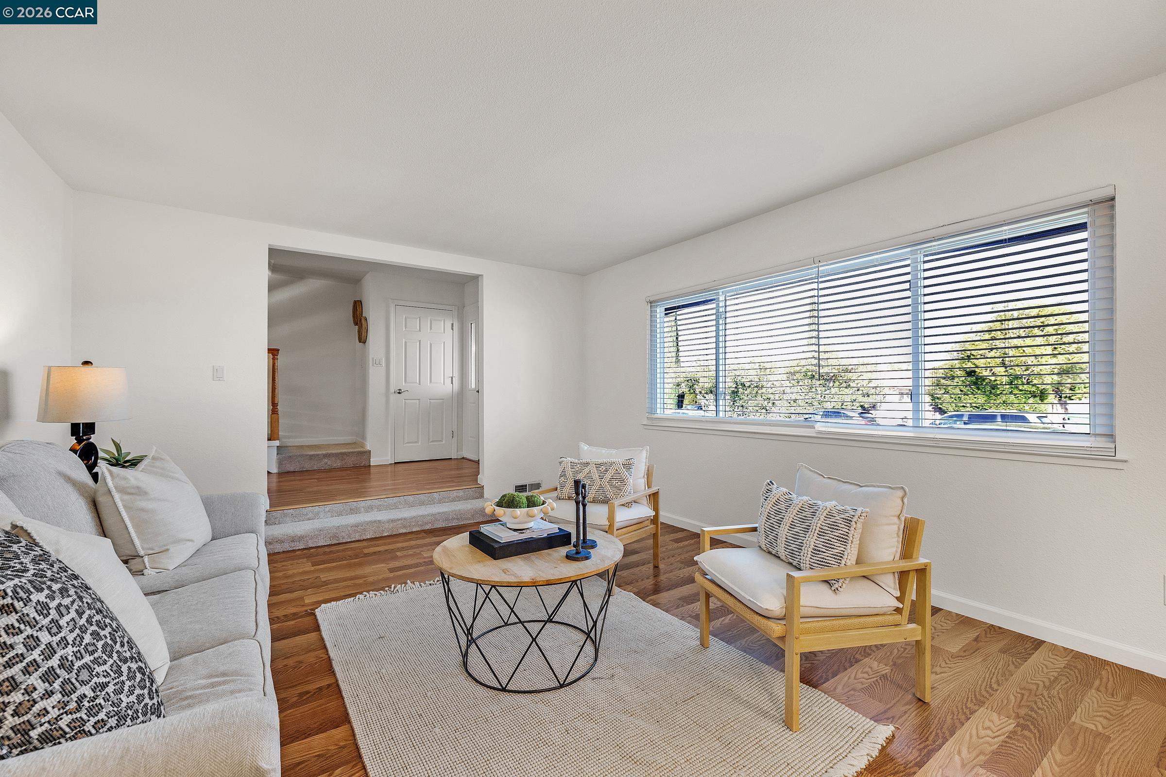 9597 Davona Drive San Ramon, CA 94583 - Photo 3 of 38 a living room with furniture and wooden floor