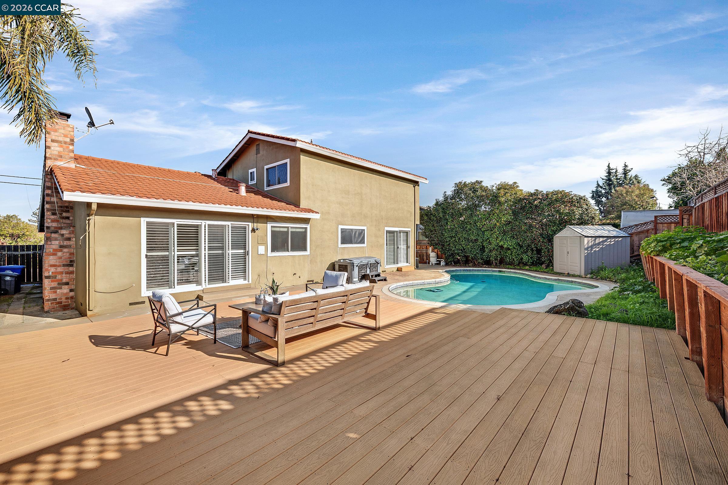 9597 Davona Drive San Ramon, CA 94583 - Photo 35 of 38 a backyard of a house with outdoor seating