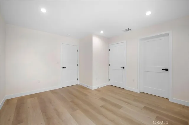 a view of a room with racks on the wall