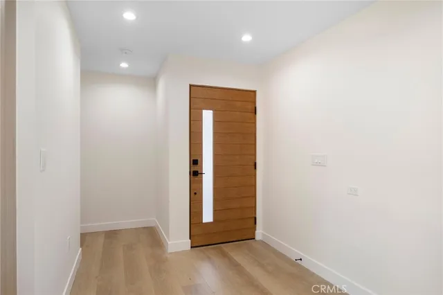 a view of a kitchen with a sink cabinets and a window