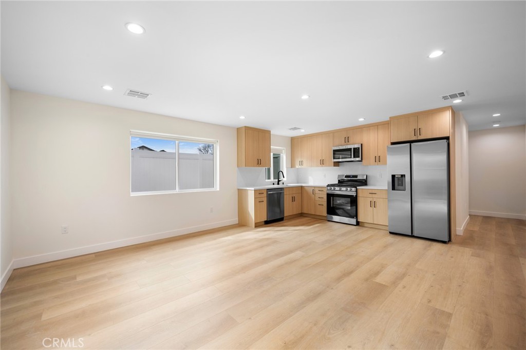 920 University Burbank, CA 91504 - Photo 5 of 20 a kitchen with stainless steel appliances a refrigerator and a microwave