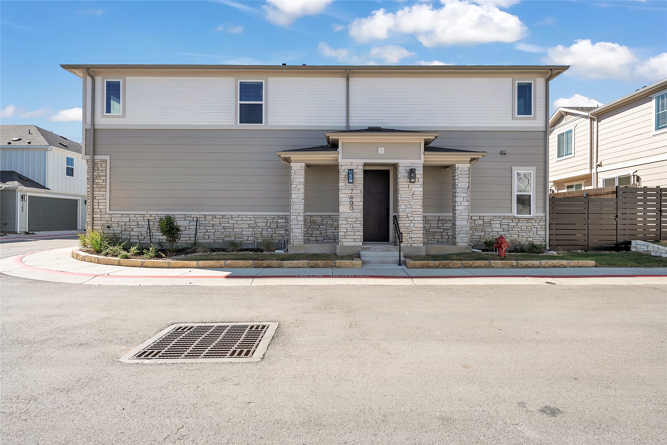 9312 Curious Squirrel Street Austin, TX 78744 - Photo 2 of 22 a view of a house with a outdoor space