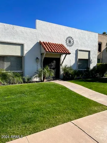 a view of a house with garden