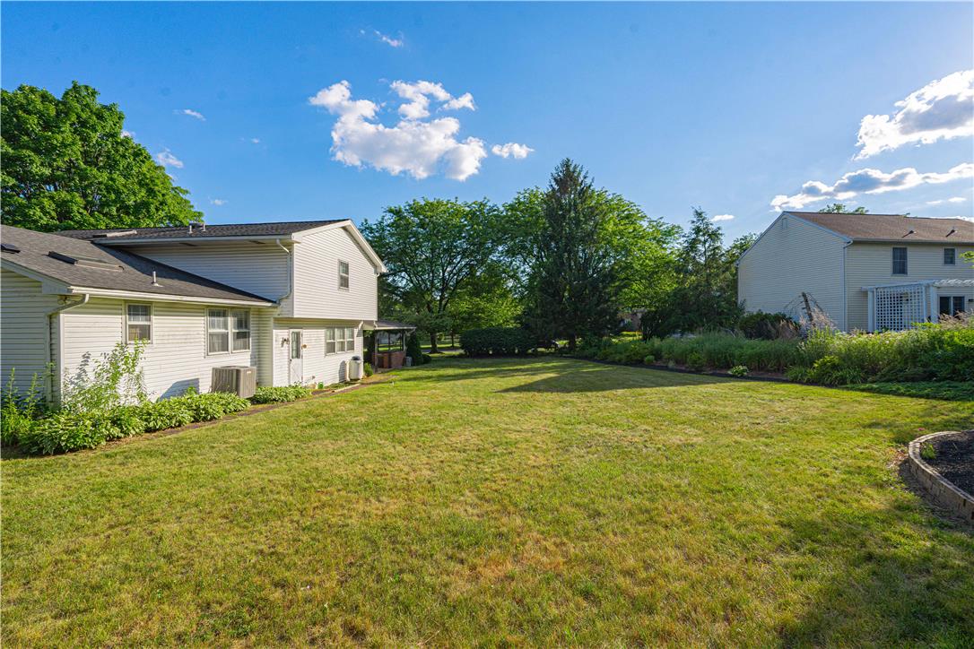 5425 Clauser Road Orefield, PA 18069 - Photo 15 of 18 A spacious, well-maintained lawn provides ample outdoor living space.