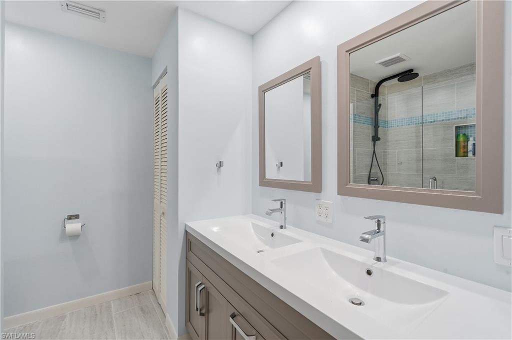 1316 Rordon Avenue Naples, FL 34103 - Photo 22 of 38 Dual vanity with integrated sinks and chrome faucets