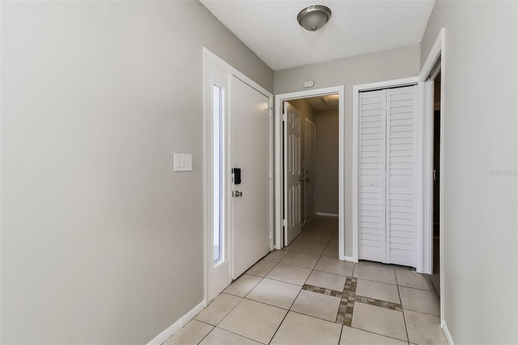 12125 Shadow Ridge Boulevard Hudson, FL 34669 - Photo 3 of 21 a view of a hallway