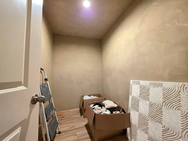 a bathroom with a double vanity sink a mirror and a shower