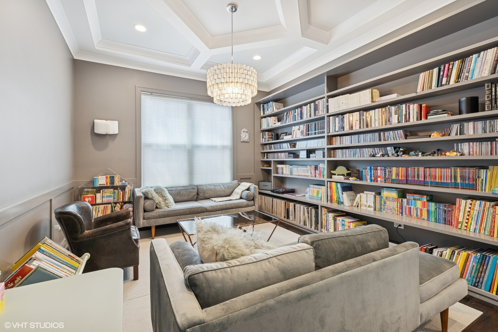 2131 Parkview Court Wilmette, IL 60091 - Photo 13 of 54 a living room with furniture a bookshelf and a book shelf