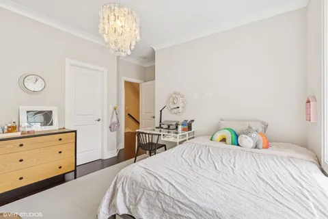 a utility room with cabinets washer and dryer