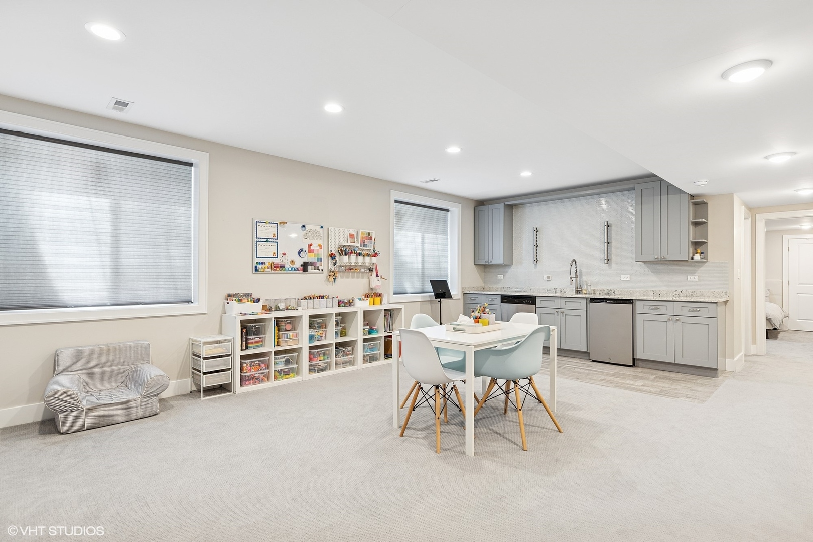 2131 Parkview Court Wilmette, IL 60091 - Photo 47 of 54 a living room with furniture a table and kitchen view