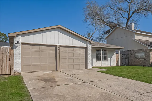 a view of a house with a garage