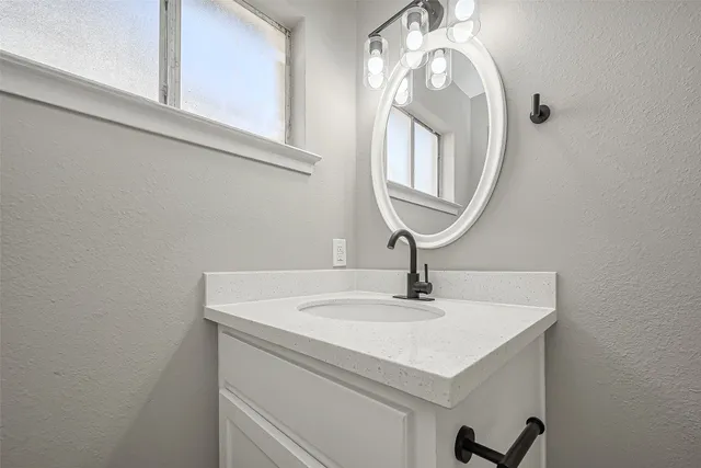 a backyard of a house with lots of green space and mountain view in back