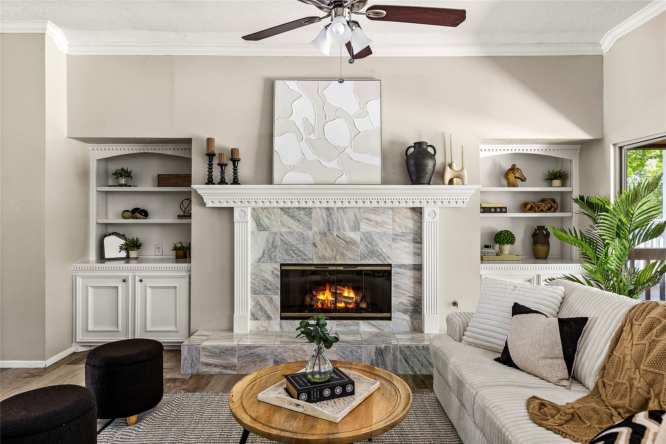 170 April Cove Conroe, TX 77356 - Photo 11 of 50 a living room with furniture and a fireplace