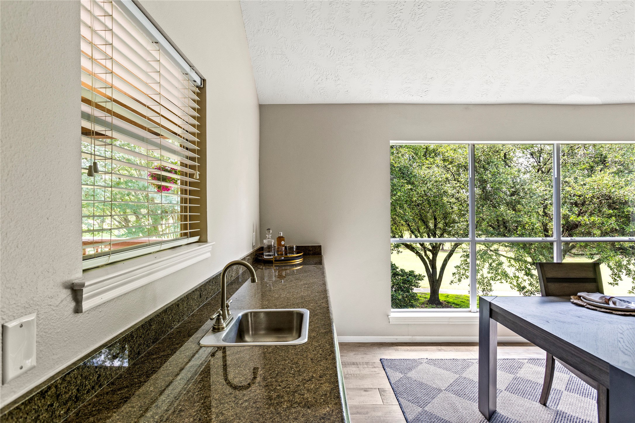 170 April Cove Conroe, TX 77356 - Photo 21 of 50 a kitchen with a sink and a window