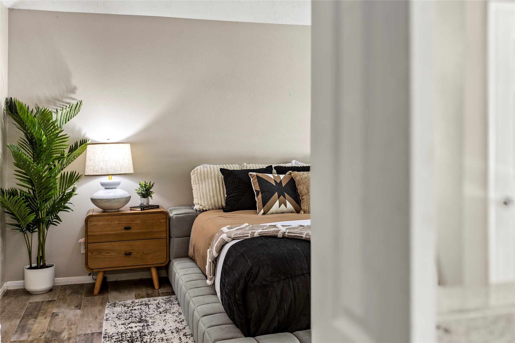 170 April Cove Conroe, TX 77356 - Photo 28 of 50 a bed room with a bed and a chair