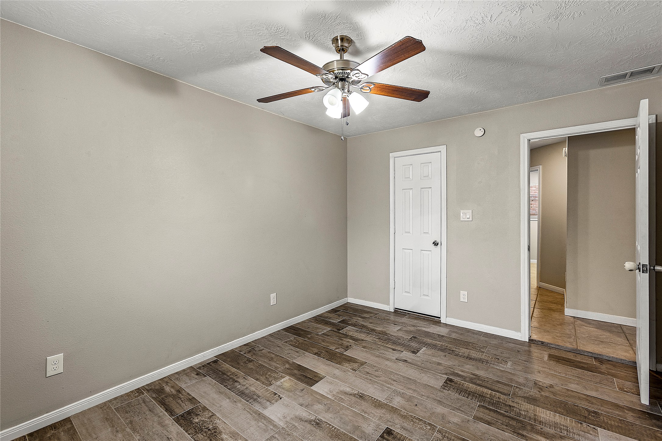 170 April Cove Conroe, TX 77356 - Photo 41 of 50 wooden floor in an empty room