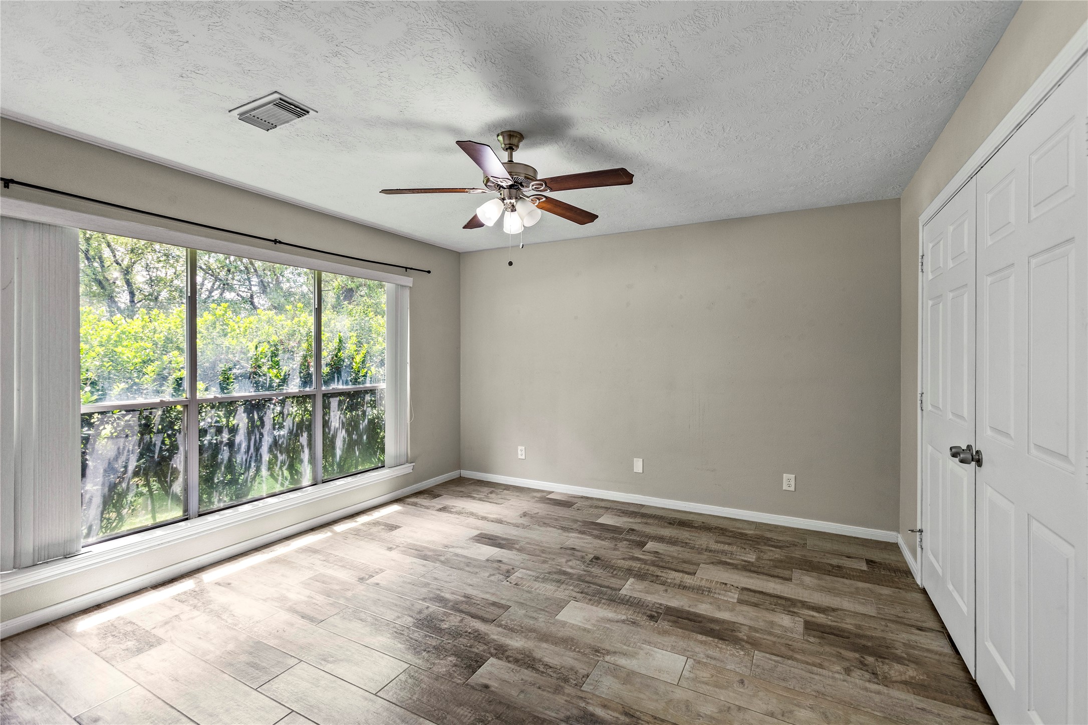 170 April Cove Conroe, TX 77356 - Photo 42 of 50 a view of an empty room with a window