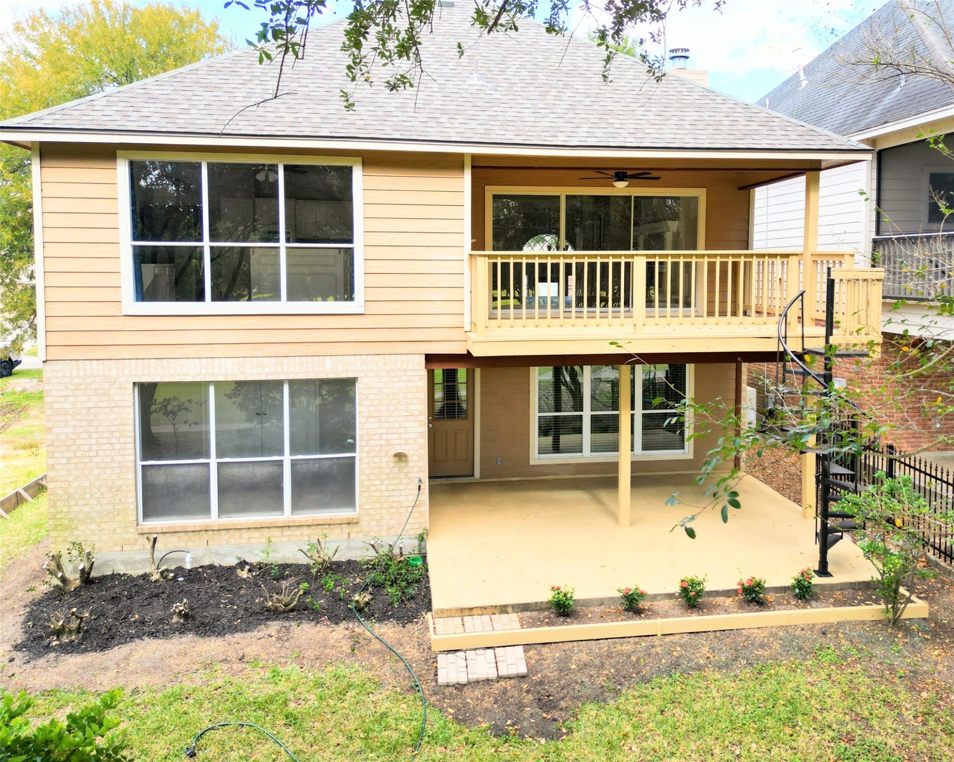 170 April Cove Conroe, TX 77356 - Photo 45 of 50 a front view of a house with a yard