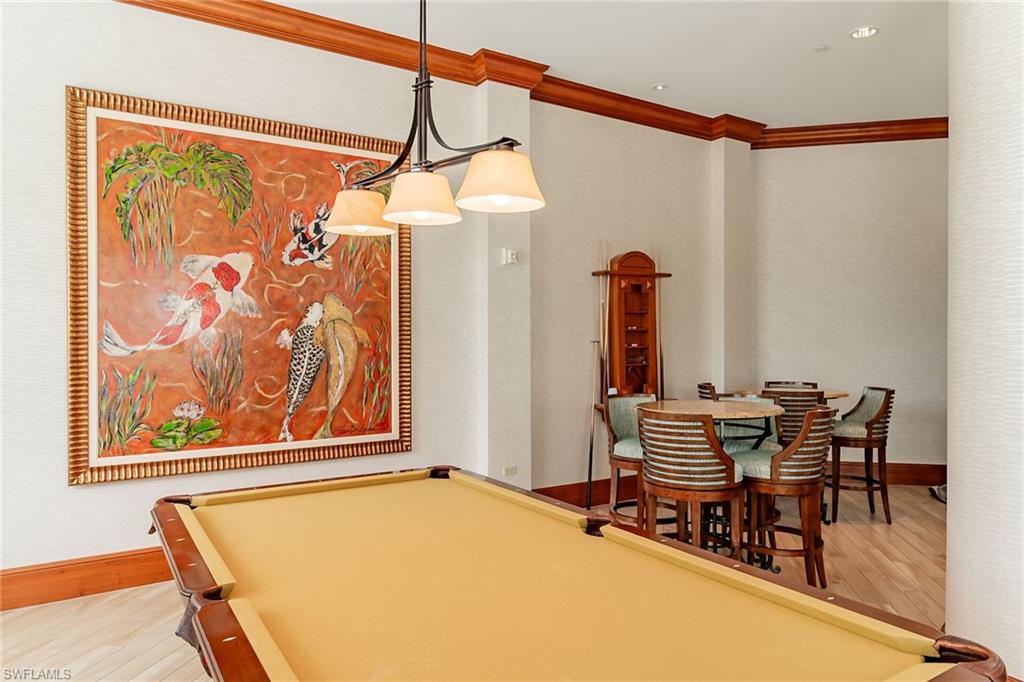 1060 Borghese Lane, Unit 803 Naples, FL 34114 - Photo 28 of 46 Playroom featuring light wood-type flooring, ornamental molding, and billiards