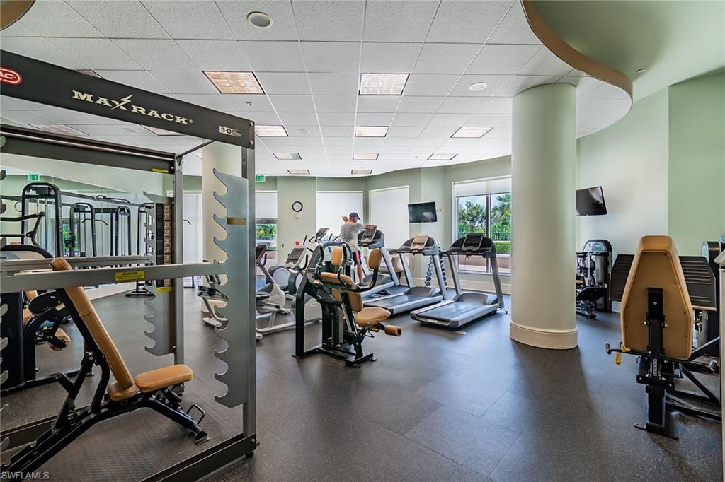 1060 Borghese Lane, Unit 803 Naples, FL 34114 - Photo 30 of 46 Exercise room featuring a paneled ceiling