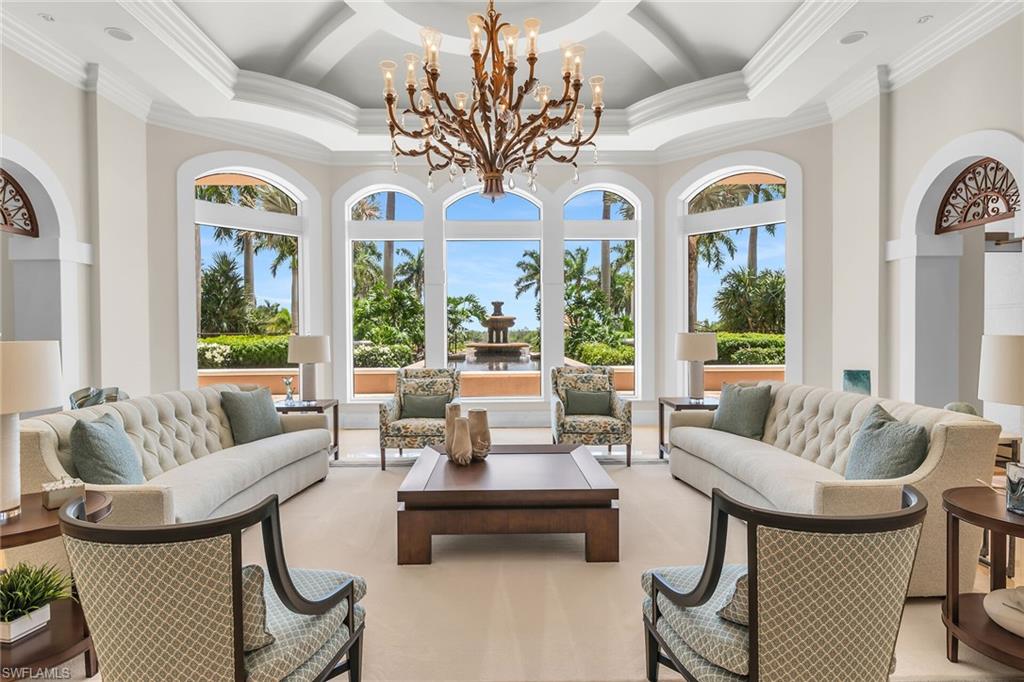 1060 Borghese Lane, Unit 803 Naples, FL 34114 - Photo 31 of 46 Sunroom with a chandelier and healthy amount of natural light