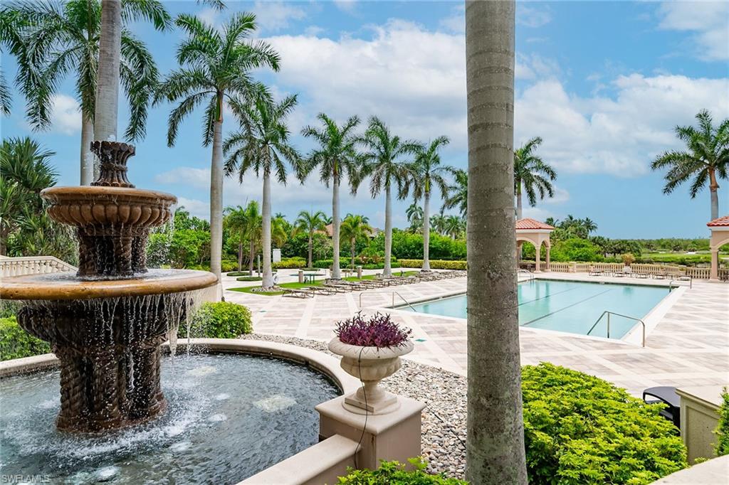 1060 Borghese Lane, Unit 803 Naples, FL 34114 - Photo 34 of 46 Community pool featuring a patio area and a gazebo