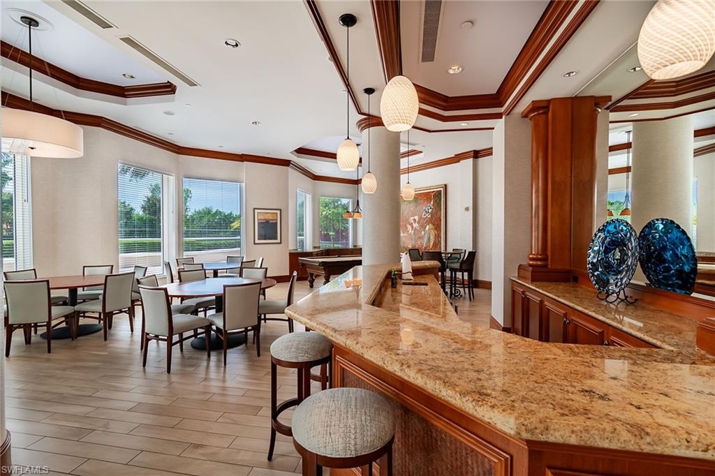 1060 Borghese Lane, Unit 803 Naples, FL 34114 - Photo 35 of 46 Common area featuring ornamental molding