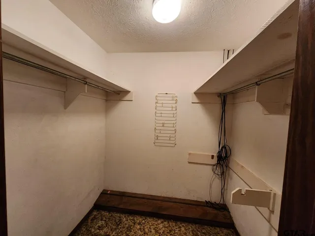 an aerial view of residential house with outdoor space and swimming pool