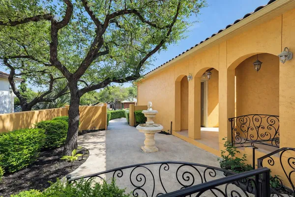 a view of a backyard of the house