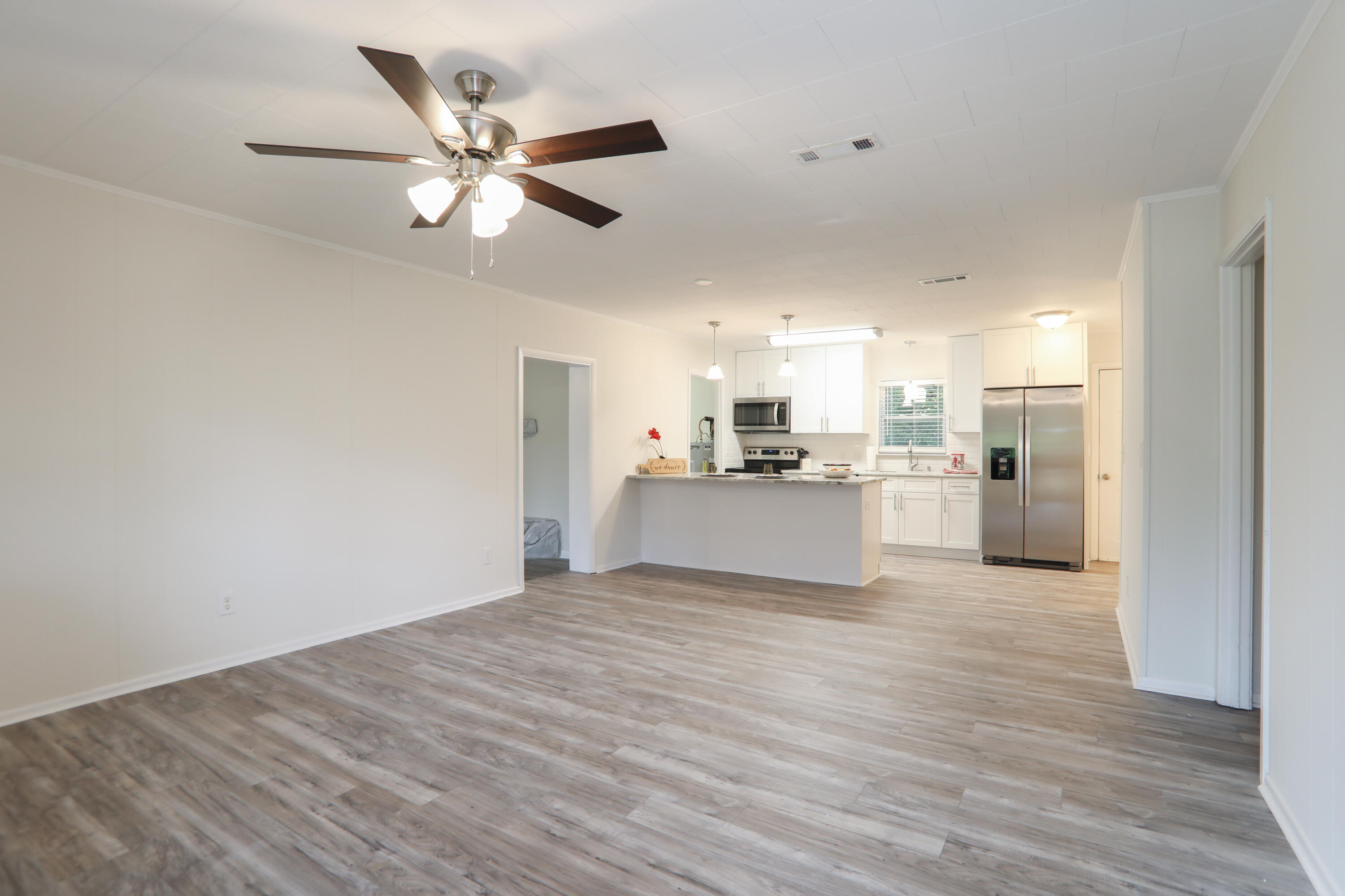 16 Pond Creek Road Crestview, FL 32539 - Photo 5 of 20 a view of a kitchen with a sink and cabinet
