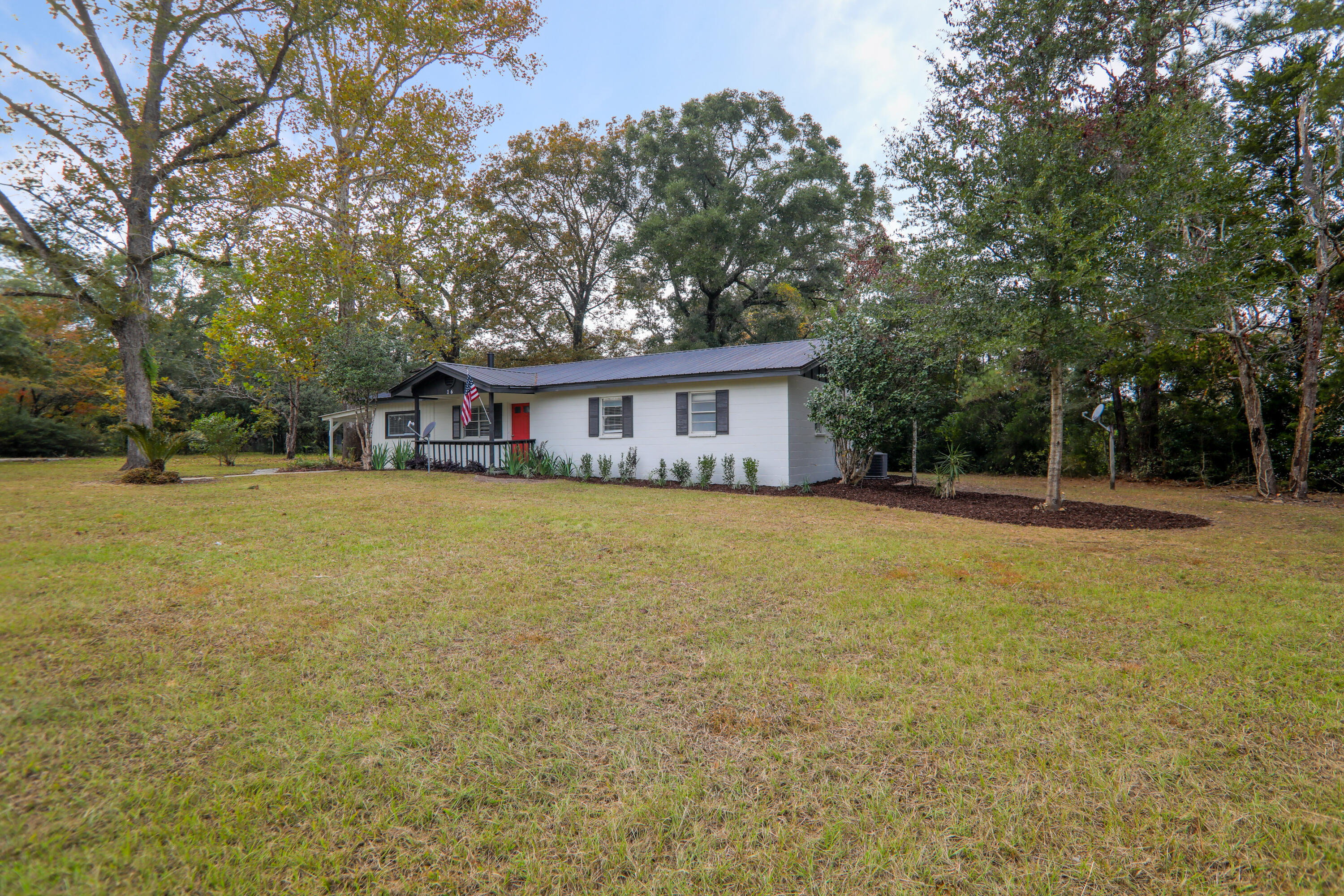 16 Pond Creek Road Crestview, FL 32539 - Photo 9 of 20 a view of house with a garden