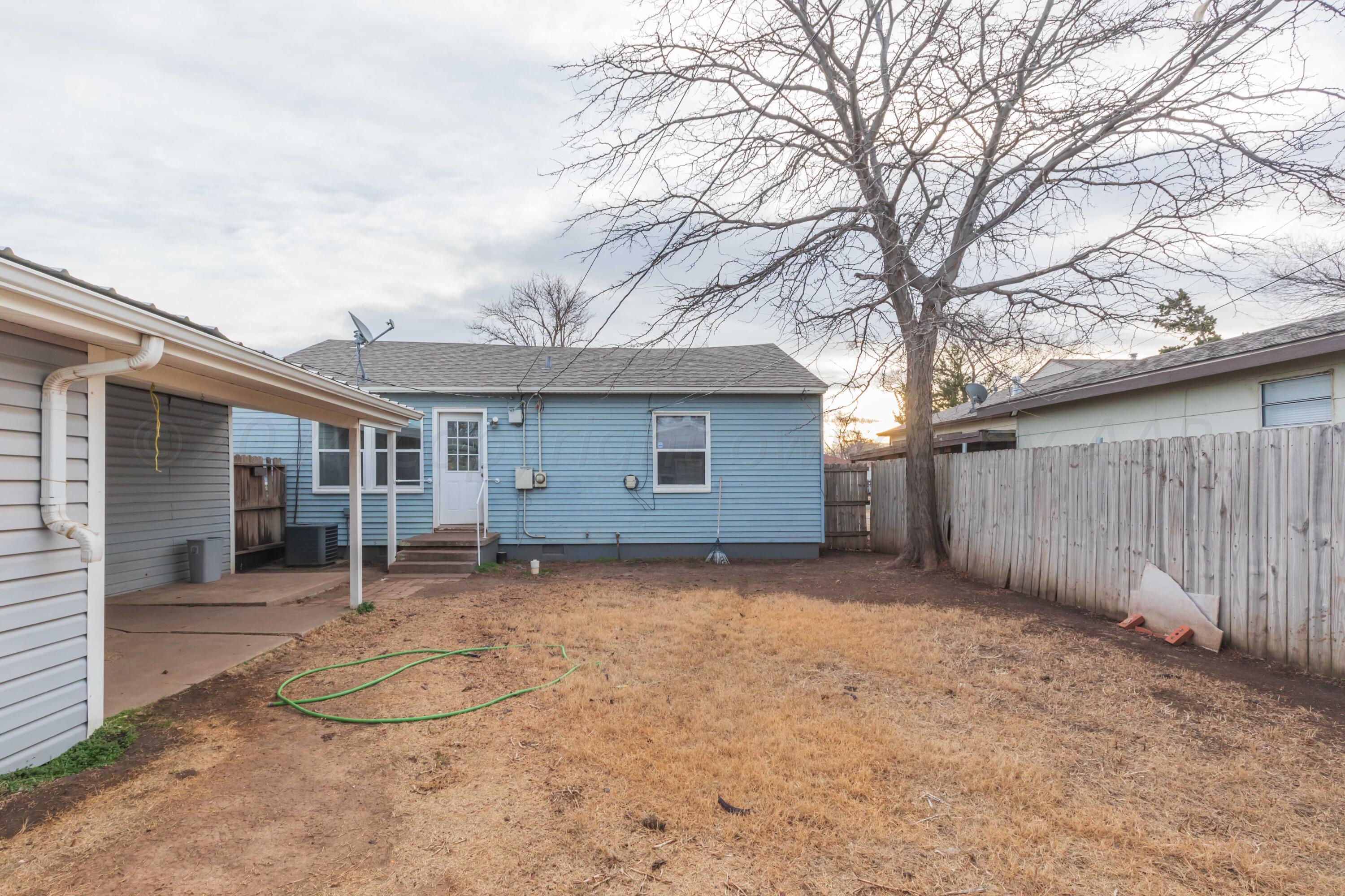 4318 South Monroe Street Amarillo, TX 79110 - Photo 36 of 36 a view of a house with a yard