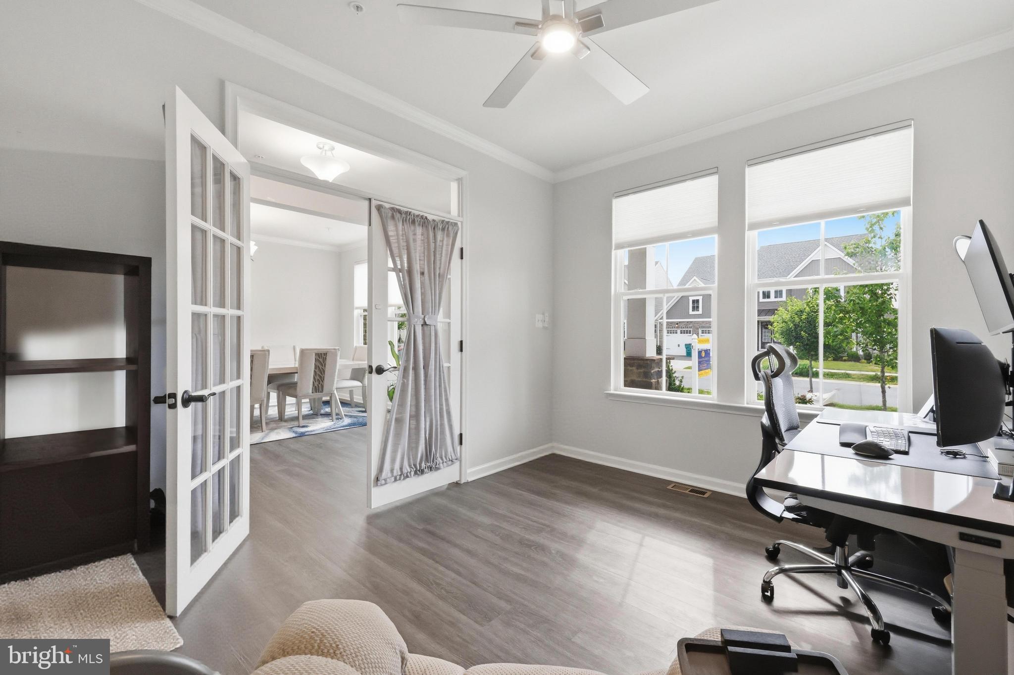 5707 Hawk Ridge Road Frederick, MD 21704 - Photo 27 of 109 a view of a workspace with furniture and a window