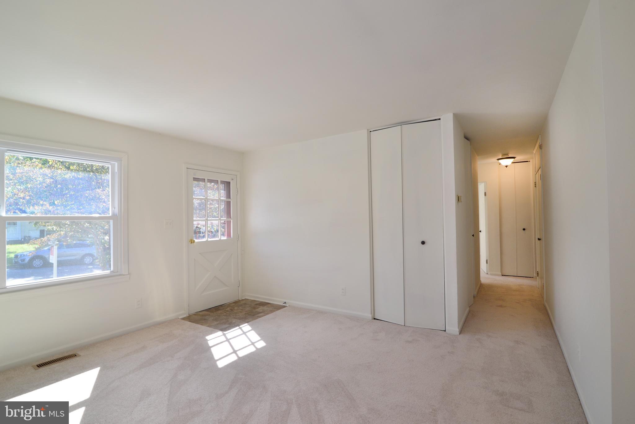 103 North Sycamore Road Sterling, VA 20164 - Photo 5 of 22 Living room and foyer