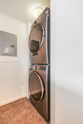 a view of a hallway with washer and dryer