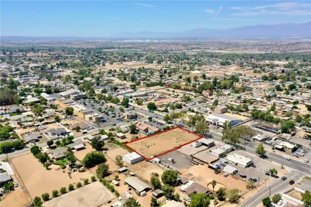an aerial view of residential building with parking space